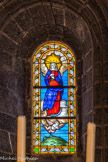 <center>Notre-Dame-de-Valvert.</center>Les trois vitraux de l'abside, du 17e siècle,
 représentent l'Assomption de la Vierge, au centre ;