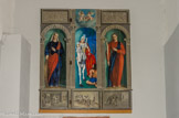 Saint Martin, encadré par Ssinte Christine, à gauche, et sainte Euphémie, à droite.