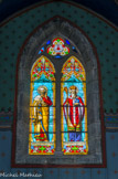 <center>Barrême </center> L’église Saint-Jean-Baptiste <br> Saint Pierre et saint Vincent sont dans une niche à volutes de feuilles d'acanthe, de fleurs et de pampres.