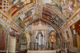 <center>Chapelle Saint Sébastien de Roure. </center> Les fresques murales, du peintre Andréa de Cella, comprennent six panneaux consacrés à la vie de Saint Bernard de Menthon à droite, et six autres, en vis-à-vis, racontant des épisodes de la vie de Saint Sébastien à gauche.