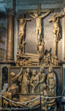 <center>Puget-Théniers</center>Eglise Notre-Dame de l'Assomption. Groupe sculpté de la Passion. Il a été réalisé en bois de tilleul ciré, vers 1520, comme le montrent les habits. Il a d'abord été attribué à Mathieu d'Anvers qui a signé en 1524 la statue de saint Jean-Baptiste qui se trouve dans l'église de Villars-sur-Var et qui était présent à Colmars-les-Alpes en 1530. Cependant, l'inégalité de l'exécution a fait attribuer l'ensemble à un atelier bourguignon ou flamand à son retour d'Italie. Les deux premiers ensembles - la Crucifixion et la mise au tombeau - traduisent une influence germanique ou flamande, en particulier dans les visages des deux larrons, de Joseph d'Arimathie et de Nicodème. L'ensemble de la Résurrection montre une influence italienne