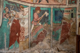 Auron. Chapelle Saint Erige dite d'Ariez <br> Apparition du Christ à saint Denis et dernière communion : près de l’autel portant un calice le Christ présente une hostie au saint qui joint les mains; derrière lui, les diacres, dont l’un tient la crosse. Le bourreau les décapite à la hache ; il va exécuter le dernier diacre. Le saint ramasse sa tête mitrée et nimbée. le saint, portant sa tête entre ses mains gantées, précède ses diacres et se dirige vers une église -la future abbaye de Saint Denis- afin de l’y déposer.