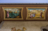 <center>Combloux, église saint Nicolas.</center>Sous l’auvent, quatre peintures représentent la légende de St Nicolas : saint Nicolas apaisant la tempête, épisode des trois filles à Myre,
