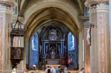 <center>Église Saint-Jean-Baptiste </center>Chœur du style gothique flamboyant. Il est meublé de beaux sièges en bois dont le dos sculpté représente des personnages bibliques.