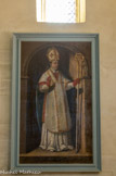 <center><center>Vaison-la-Romaine : la chapelle Saint-Quenin</center></center>Ce tableau est le plus ancien. Il est peint à la suite du vœu d'un croyant (S. Qvirinidvs. Ex voto). Quenin bénit de la même droite et tient la crosse épiscopale de la gauche. Il est coiffé d'une mitre blanche auréolée. Il est coiffé d'une mitre blanche auréolée. Il est ganté de rouge et vêtu de blanc. Le peintre a soigné le visage, l'attitude est un peu statique.