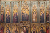 <center>Les Arcs sur Argens : L’église Saint Jean Baptiste.</center>Sur le second registre est représenté dans un paysage avec une ville fortifiée, le Christ en croix entouré à gauche par la Vierge en manteau bleu et à droite par saint Jean en manteau rouge. À gauche saint Victor, officier romain converti, est représenté en cuirasse avec une cape vermillon portant une bannière à croix rouge. À l’extrême gauche saint Blaise en habit d'évêque, bénit de la main droite et porte la crosse de la gauche. À droite saint Sébastien le corps criblé de flèches. À l’extrême droite Marguerite d'Antioche est représentée avec un dragon furieux à ses pieds. Les bandes latérales : à droite et de bas en haut, Catherine d'Alexandrie en cape écarlate et un saint évêque avec une chape verte ; à gauche, Marie Madeleine en manteau écarlate soulevant le couvercle d'un vase à parfum et sainte Marthe tenant en laisse la tarasque.
