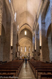 <center>L'abbaye Sainte-Marie-d'Arles-sur-Tech </center>Conçue comme une basilique antique, l'église est structurée par une grande nef à trois vaisseaux et son chœur principal est placé à l'ouest. La disposition du chœur, courante dans les édifices carolingiens des régions nordiques, est unique dans la région. Cette « tradition » s’expliquerait par la survivance de pratiques liturgiques spécifiques au haut Moyen Âge. Les trois nefs à l’origine charpentées ont dû recevoir le voûtement actuel en 1157, date de la nouvelle consécration de l’édifice. La nef centrale est couverte en berceau brisé. tandis que les collatéraux sont couverts en plein cintre. Les piliers de support doublent le premier mur du XIe siècle. Comme dans toutes les églises de type basilical, des fenêtres hautes éclairent la nef centrale. Les piliers de support doublent le premier mur du XIe siècle. Comme dans toutes les églises de type basilical, des fenêtres hautes éclairent la nef centrale.