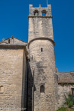 <center>La cathédrale Notre-dame de Nazareth</center>Un clocher carré s'élève au-dessus de la dernière travée du collatéral nord, contre l'absidiole septentrionale. La partie supérieure de ce clocher est percée de trous de boulin et ornée d'une frise de rinceaux, d'une corniche à modillons et d'ouvertures décorées de colonnettes.