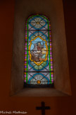 <center>L'église Saint André</center>Mort de Charles de Foucauld (?), ordonné prêtre à Viviers en 1901 et mort en 1916 à Tamanraset. Vitrail de l'Atelier Thomas, Valence, 1923