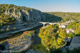 <center>Vue prise du clocher de l'église romane. </center>Pont de la route des Gras. Balazuc est accroché aux falaises qui bordent l'Ardèche, dans le Vivarais méridional. Le cours de l'Ardèche forme une frontière naturelle entre la vallée du Rhône et le Massif central. Balazuc s'est installé au niveau d'un passage à gué naturel, longuement emprunté avant d'être supplanté par la traversée en bateau, puis par le pont.