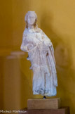 <center>Le Musée d'Art Sacré du Gard. </center> Vierge à l'Enfant, début du XIVe siècle.
Le 15 août 1944, lors du bombardement aérien de Pont-Saint-Esprit, le souffle d'une bombe a fait jaillir du cours du Rhône cette Vierge à l'Enfant. C'est peut-être la statue de Notre-Dame des Miracles, jetée dans les eaux du fleuve à la Révolution. Le roi Philippe le Bel l'avait offerte à l'Œuvre hospitalière du Saint-Esprit, qui réunissait les marchands de la ville dont les Piolenc.
Svelte et assez fortement hanchée, cette Vierge rappelle le travail des ateliers d'ivoiriers parisiens de la fin du XIIIe siècle.
