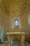<center>La Chapelle St Sauveur de Truel</center> Derrière l'autel, le claustra roman.
