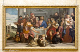 <center>Les Pèlerins d'Emmaüs. Vers 1559</center>Paolo Caliari, dit VÉRONÈSE. Cette œuvre de jeunesse, première représentation d'un repas biblique dans la carrière de Véronèse, est construite comme une scène de théâtre incluant des portraits de personnages contemporains. Une famille patricienne de Venise assiste, avec ses domestiques et ses chiens, au souper d'Emmaüs (Luc, 24,13-35) au cours duquel deux disciples, identifiés par la tradition
à Luc et Cléophas, reconnaissent le Christ ressuscité à la fraction du pain. En mêlant intimement, comme dans un grand nombre de ses créations, le divin et le terrestre, Véronèse entend mettre l'accent sur l'humanité du Christ et introduire le sacré dans la vie quotidienne.