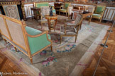 <center>Chambre d'apparat de Mme Thierry de Ville d'Avray.</center>Six fauteuils à la Reine.  Georges Jacob. 1750-1799. hêtre : doré, taillé ; tapisserie au point. fauteuils en bois doré à dossier et assise rectangulaires, ornés d'un décor de rubans enroulés, rehaussés sur le haut du dossier et le long des accotoirs d'un rang de perles. Les accotoirs, portant manchette, sont dotés de poignée formée d'une volute. Ils reposent sur une colonette cannelée à base renflée ornée de feuilles de lauriers. Les pieds cylindro-coniques cannelés sont surmontés d'un cube orné de deux rosaces. La tapisserie couvrant le dossier est décorée d'un médaillon rectangulaire à fond blanc bordé de fleurs aux couleurs naturelles et sur lequel se détachent les initiales CD entrelacées et couronnées de fleurs. Sur l'assise, des trophées formés d'instruments de musique et d'attributs de l'amour entremelés de fleurs se développent dans un médaillon rectangulaire. Les manchettes sont quant à elles garnies de tapisseries à médaillons de fleurs ovales.