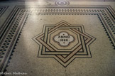 <center>La Basilique Cathédrale Sainte-Marie-Majeure</center>Charles Errard a dessiné la mosaïque du tapis lapidaire du sol, dont la fabrication a été assurée par l'entreprise Società musiva venziana et la pose par M. Mora. Les thèmes sont ceux des mosaïques de l'ancien baptistère.