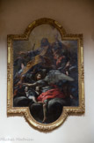 <center>Eglise Saint-Roch, Mazargues.</center> Michel Serre est né à Tarragone en Espagne en 1658. En 1670, il fait un voyage à Rome puis s’installe à Marseille en 1675 y meurt en 1733. Cette toile imposante, œuvre majeure du peintre, représente l'apothéose de Saint Roch, a été peinte à la fin du XVIIème siècle pour l'autel de la chapelle Saint-Roch, donnée aux Grands Carmes par les seigneurs de Mazargues : le saint est représenté lors de sa montée au ciel porté en gloire par des anges. Parmi ceux-ci, le peintre a fait figurer son fils. Michel Serre est un excellent coloriste, on le voit ici par les manteaux rouge et jaune d’or. Saint Roch n’est pas représenté comme d’habitude, mais sous l’habit de pèlerin de st Jacques de Compostelle, ce qui a pu parfois le faire confondre avec St Jacques le Majeur. Sa restauration a été réalisée en 2008