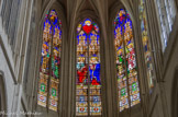<center>L'église Saint-Gervais.</center>A gauche,  Saints Pierre et Paul, au centre, le Christ bénissant et la Vierge, à droite, saints Gervais et Protais. Vitraux de la seconde moitié du XIXe siècle.