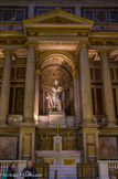 <center>L'église de la Madeleine. </center> La statue de saint Augustin est l'œuvre d'Antoine Etex (1808-1888) qui a montré le Père de l'Église s'apprêtant à écrire alors que son pied droit foule le livre des hérésies donatistes et pélagiennes qu'il combat.