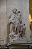 <center>Église Saint-Roch. </center> La dédicace de l’église à saint Roch, patron des pestiférés, explique certainement ce choix. Statue de Louis-Aimé Lejeune, 1946.