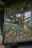 <center>Le cyclop.</center>Mur de gants.