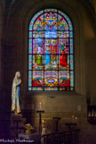 <center> l'église Saint-Pierre-Saint-Paul. </center>La bénédiction de sainte Geneviève, par saint Germain et saint Loup. . Vitrail de H. Garnier, 1885.