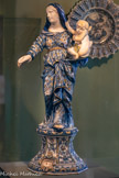 <center>Vierge à l’Enfant</center>Marseille, fabrique Joseph Fauchier
1735
Faïence, décor de grand feu polychrome : bleu, jaune, vert, rouge.
Marseille, Château Borély - Musée des Arts décoratifs, de la Faïence et de la Mode, Inv.1998.7.1. La Vierge à l’Enfant de Fauchier est clairement inspirée des productions rouennaises contemporaines. La couleur rouge y est pareillement apposée en petites stries parallèles, gardant ainsi tout son éclat à la cuisson.