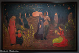 <center>Georges Lacombe (1868 -1916)</center>Les Âges de la vie (Le Printemps) 1893-1894
Peinture à l'œuf sur toile. <br>
À l'origine, cette décoration était constituée de quatre panneaux, conçue comme le cycle des saisons ou des âges de la vie. De cette suite, il ne reste que L'Automne (Pasadena, Norton Simon Museum) et celle présentée ici .Il s'agit du seul ensemble décoratif peint par Georges Lacombe, qui se consacrera ensuite à la sculpture. Le couple enlacé, au centre, incarne la vie qui reprend à la fin de l'hiver, personnifié par les trois vieillardes encapuchonnées qui s'éloignent entre les arbres. Cette formulation archaïque se double ici d'un hiératisme alangui - visage penché, yeux baissés, silhouettes ondulantes soulignées d'un cerne noir - qui donne au panneau une tonalité médiévale, une évocation moderne de l'amour courtois.