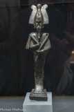 <center>Exposition : Voyages extraordinaires, quand dieux et héros sillonnaient le monde.</center>Sculpture Osiris Momiforme. Alliage cuivreux, dorure. Basse Epoque. Egypte