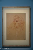 <center>Exposition Toulouse-Lautrec.</center> Tête de femme, vue de trois quarts à gauche
Sanguine sur carton gris