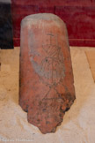 <center>Cordes-sur-ciel. Musée Charles Portal.</center>Tuile pour protéger la maison.Tuile avec une inscription religieuse gravée dans la pâte avant cuisson : une croix, peut être le Sacré-Cœur et le nom de Marie.
Les tuiles de protection divine» étaient placées près du dite de la toiture côté  rue pour protéger la maison de la foudre.