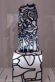 <center>Abbaye de Beaulieu-en-Rouergue  </center>Jean Dubuffet (Le Havre, 1901 - Paris, 1985) 
Portrait d’homme V
Novembre 1966 
Transfert sur polyester. 
La période dénommée L'Hourloupe (1962-1974) occupe une place à part dans l'œuvre de Jean Dubuffet. En 1966, il commence à travailler le polystyrène expansé. Facile à sculpter grâce à un fil de fer chauffé, ce matériau lui permet de projeter dans l'espace son écriture « hourloupéenne », faite de dessins semi-automatiques griffonnés au stylo bille pendant ses conversations téléphoniques. Extrêmement fragiles, ces œuvres en polystyrène expansé ont été pour partie transférées sur polyester, comme ce Portrait d’homme V.