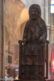 <center>Beaune </center>La Vierge en Majesté dite Notre-Dame de Beaune est l’un des trésors de l’église. C’est une vierge noire en bois polychrome des années 1200, sculptée dans un bois fruitier qui s’est assombri avec le temps, et  qui provient probablement de l’Auvergne. La Vierge, assise sur le Trône de Sagesse avec des ornements géométriques et végétaux, porte l'enfant Jésus dont le bras et le pied ont disparu.