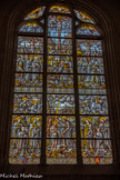 <center>Beaune </center>Chapelle Saint Flocel dite de Bouton. Vitrail : baptême et crucifixion de Jésus (Didron 1896), président au vitrail : le Saint Esprit.