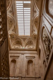 <center>Le musée des Beaux-Arts de Dijon</center>L'escalier monumental. Pour permettre au musée de s’agrandir et de loger l’école des Beaux-Arts, une nouvelle aile est édifiée, à l'est, entre 1852 et 1856. Les noms d'illustres Bourguignons, artistes, hommes de lettres et de sciences, sont gravés sur la façade, côté place de la Sainte-Chapelle, mais aussi dans ce grand escalier. Rameau, Prudhon.