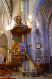 <center>Vias : l'église Saint-Jean-Baptiste </center>Chaire avec abat voix et panneaux sculptés, rampe en fer forgé de style Louis XV.