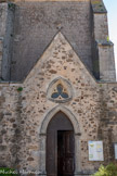 <center>Portiragnes : église Saint-Félix.</center>Le côté nord présente
un portail postérieur à l’église et un œil-de-bœuf trilobé
situé au-dessus d’une porte ogivale entre colonnettes. Le pinacle est surmonté d'une croix.
