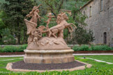 <center>Abbaye de Fontfroide.</center>Le Char d’Apollon.
Cet ensemble en terre cuite, représentant Apollon et Diane, a été réalisé au XIXème siècle par les frères Gossin pour le château de Vaux-le-Vicomte. Gustave Fayet l'a acheté en 1908 et placé à l’entrée de l’abbaye dans le jardin dit « d’Apollon ». Classé Monument Historique, il a certainement inspiré Odilon Redon pour sa toile « Le jour » de la Bibliothèque de l’abbaye de Fontfroide. Mais les intempéries et le lierre ont causé de nombreux dégâts : au début du XXIème siècle le char d’Apollon est brisé en centaines de morceaux. En 2011, il est restauré.