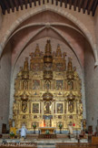 <center>Retable de Baixas.</center>C’est le plus grand retable de France  h = 17 m ; l = 12 m. En 1671, on décide de construire un grand retable. On fait appel au sculpteur Luis Generes, qui avait son atelier à Perpignan. En 1671, au moment où le baroque a fort évolué, dans la région, lui, continue à exécuter des retables extrêmement compartimentés, beaux, mais un peu raides. Ce retable est traitée « all’antica », comme une façade d’église, avec trois corps sur trois étages. Il coûta si cher à l’époque qu’un proverbe catalan en est même né : « ha tant costat com el retaule de Baixas ». Ce qui signifie « aussi cher que le retable de Baixas ».