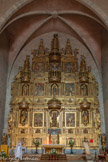 <center>Retable de Baixas.</center>Ce retable est en bois : la structure sera en pin, et  les sculptures en peuplier. Dans les divers compartiments, il y a de véritables tableaux, traités en bas-reliefs,  illustrant des épisodes de la vie de la Vierge : Nativité, Annonciation, Couronnement…., les évangélistes..