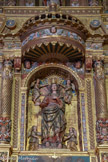 <center>Retable de Baixas.</center>Notre Dame des Anges dans la niche centrale du retable. Notre Dame est représentée comme une reine majestueuse, une main sur son cœur tandis que l'autre se tend vers nous pour nous inviter à l'amour de Dieu et nous encourager à monter au Ciel comme elle.