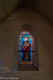 <center>Montpeyroux</center> Église de l'Assomption. Les vitraux sont de la Maison Champigneulle de Bar le Duc, fin XIXe. Sainte Elisabeth.