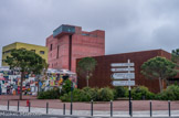 <center>Perpignan</center>Les Ateliers Jean Nouvel et Métra & Associés ont relevé le défi de la création de ce haut lieu de la vie culturelle perpignanaise. Le caractère éclaté du projet théâtral, l’emploi de matières qui évoquent l’architecture traditionnelle locale (la brique et le fer) et la création d’un environnement végétal méditerranéen répondent parfaitement à l’ancrage identitaire du lieu et à la logique d’archipel, fil conducteur du projet urbain de la ville.