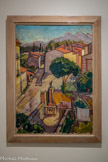 <center>Musée d'Art Moderne de Céret</center>André Masson (1896-1987)
Rue de  Céret 1919
Huile sur toile
Don de la Galerie Louise Leiris.
Séjours à Céret de 1919 à 1920, séjour à Perpignan en 1929
André Masson reçoit une éducation solide en peinture à l'Académie royale des Beaux-Arts de Bruxelles puis aux Beaux-Arts de Paris. Malgré le profond traumatisme de la guerre, il reprend finalement goût à la peinture. Ces paysages sont influencés par Cézanne, Van Gogh : réalisme solide et légèrement géométrique. Ici le point de vue plonget sur le premier plan alors que les arrière-plans se redressent.