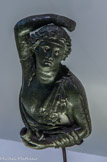 <center>Bacchus</center>Applique d’accoudoir
Volubilis, Maroc. Ier siècle apr. J-C.
Bronze, jeux incrustés d'argent.