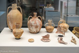 Mobilier de l'épave de Plane III dite «sarrasine »
Rade de Marseille. Ile Plane,
Xe siècle. Céramique.
Au VIIIe siècle, les Arabes font des razzias en Provence où ils s'installent Matériel mise au jour dans cette épave sarrasine. Tinaja jarre (A), col (B) et fond de jarre (C), amphores (D), jarre à bec trilobé (E), vase à filtre (F), fragment de vase à filtre (G), lampes à huile (H), meul (I), filtre à sept trous (J), col de cruche (K).