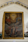 <center>Le Val. </center> Tableau représentant la Trinité etl'Assomption de la Vierge Marie. Il constituait la partie centrale du retable du maître-autel de la paroisse. Il date probablement des années 1670 – 1700.