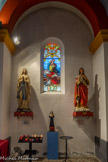 <center>Eglise Saint-Cyr et Sainte-Julitte</center>Bas-côté gauche, vers l'entrée. Statues de Notre Dame de Lourdes et du Sacré Coeur.