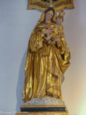 <center>Eglise Saint-Cyr et Sainte-Julitte</center>Bas-côté gauche. Statue de la Vierge et de Jésus couronnés.