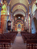 <center> La  cathédrale Notre-Dame-et-Saint-Véran</center>L'église est composée par une grande nef unique de cinq travées voûtées en berceau brisé reposant sur des arcs doubleaux.