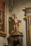 <center>L'église Saint-Nicolas. </center>Chapelle SAINT ROCH. La statue de gauche représente le martyre de St Sébastien, officier de l'armée romaine, transpercé de flèches.